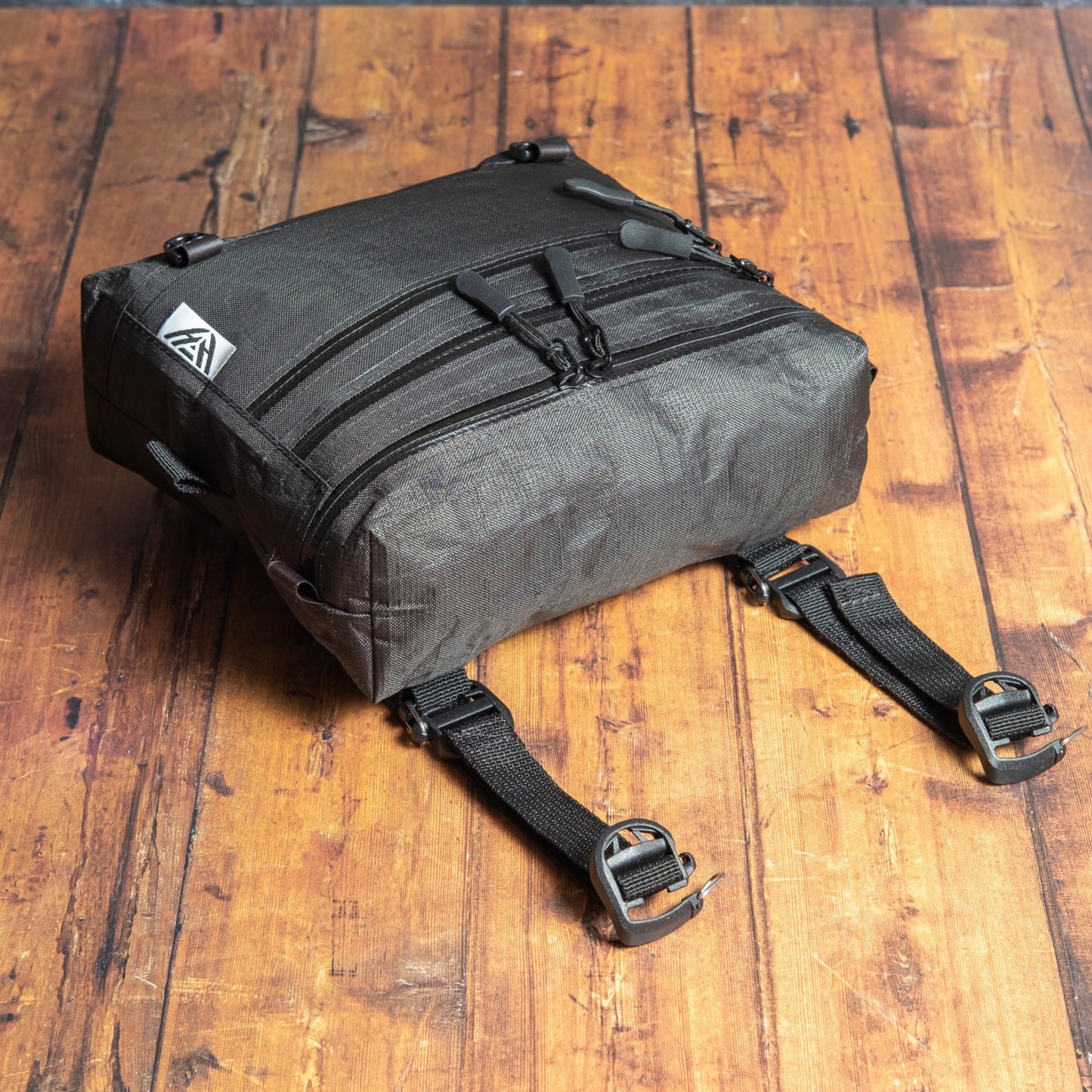 Handmade Ultra 200X chest pack with three YKK Aquaguard zip compartments and detachable mounting straps.