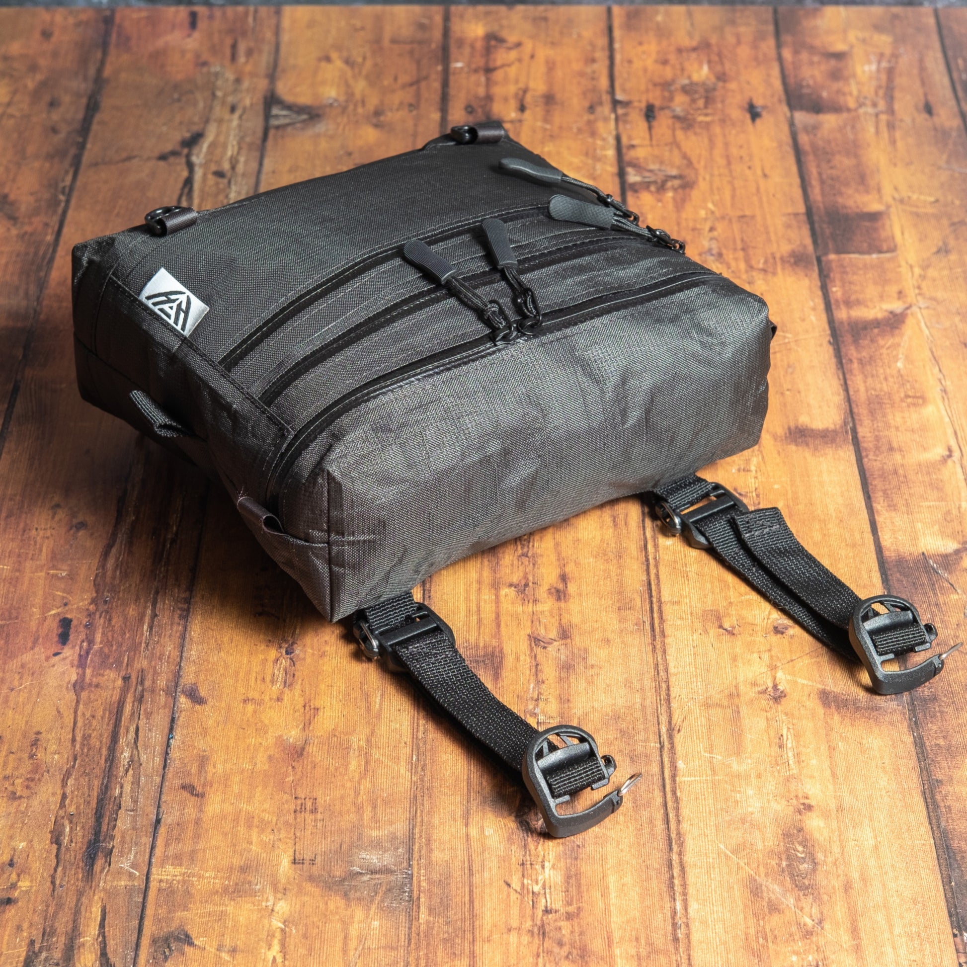 Handmade Ultra 200X chest pack with three YKK Aquaguard zip compartments and detachable mounting straps.