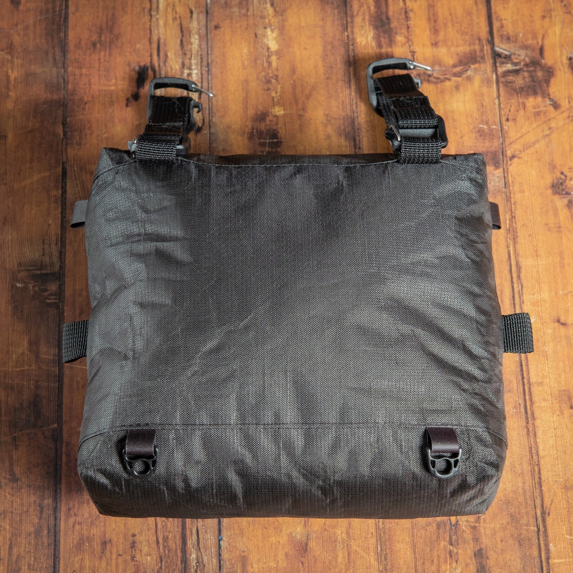 Rear view of Ultra 200X chest pack showing reinforced attachment points and backpack mounting straps