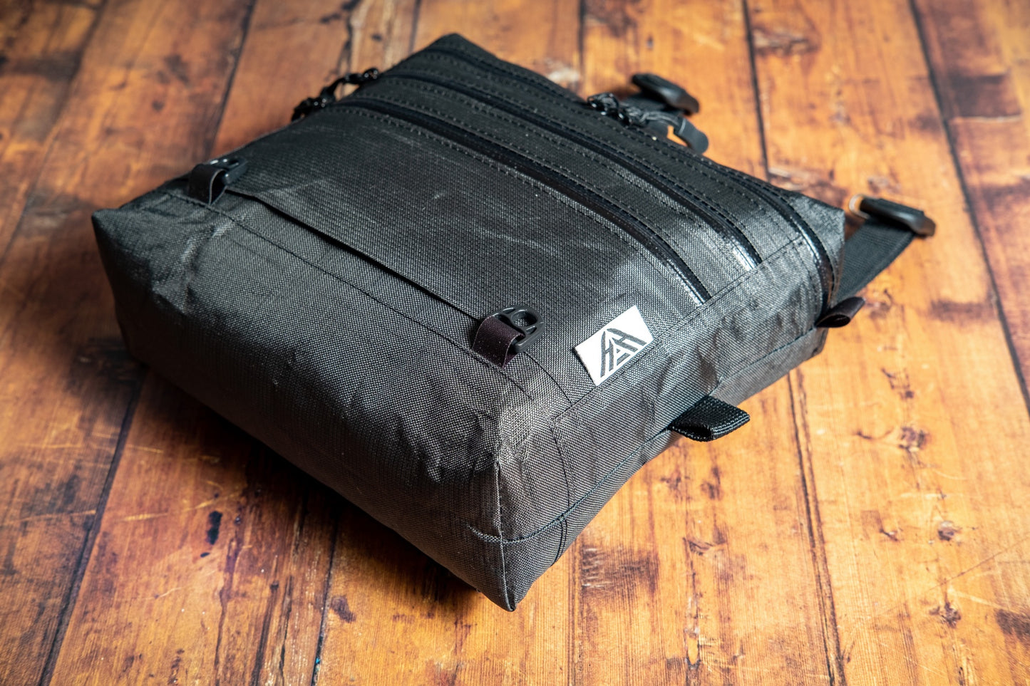 Lightweight 3L Ultra 200X chest pack with weather-resistant YKK Aquaguard zips and reinforced attachment points.