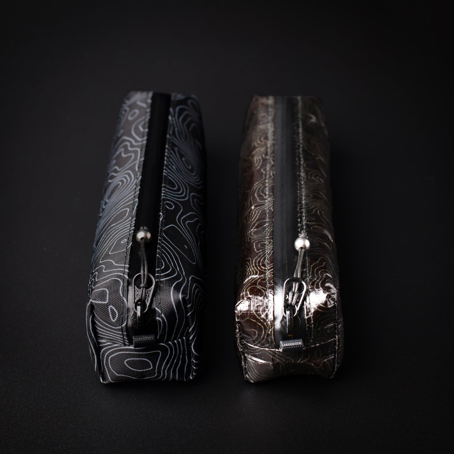 VX15 X-Pac and Dyneema Composite Fabric Topo Writing Instrument Cases shown side by side.