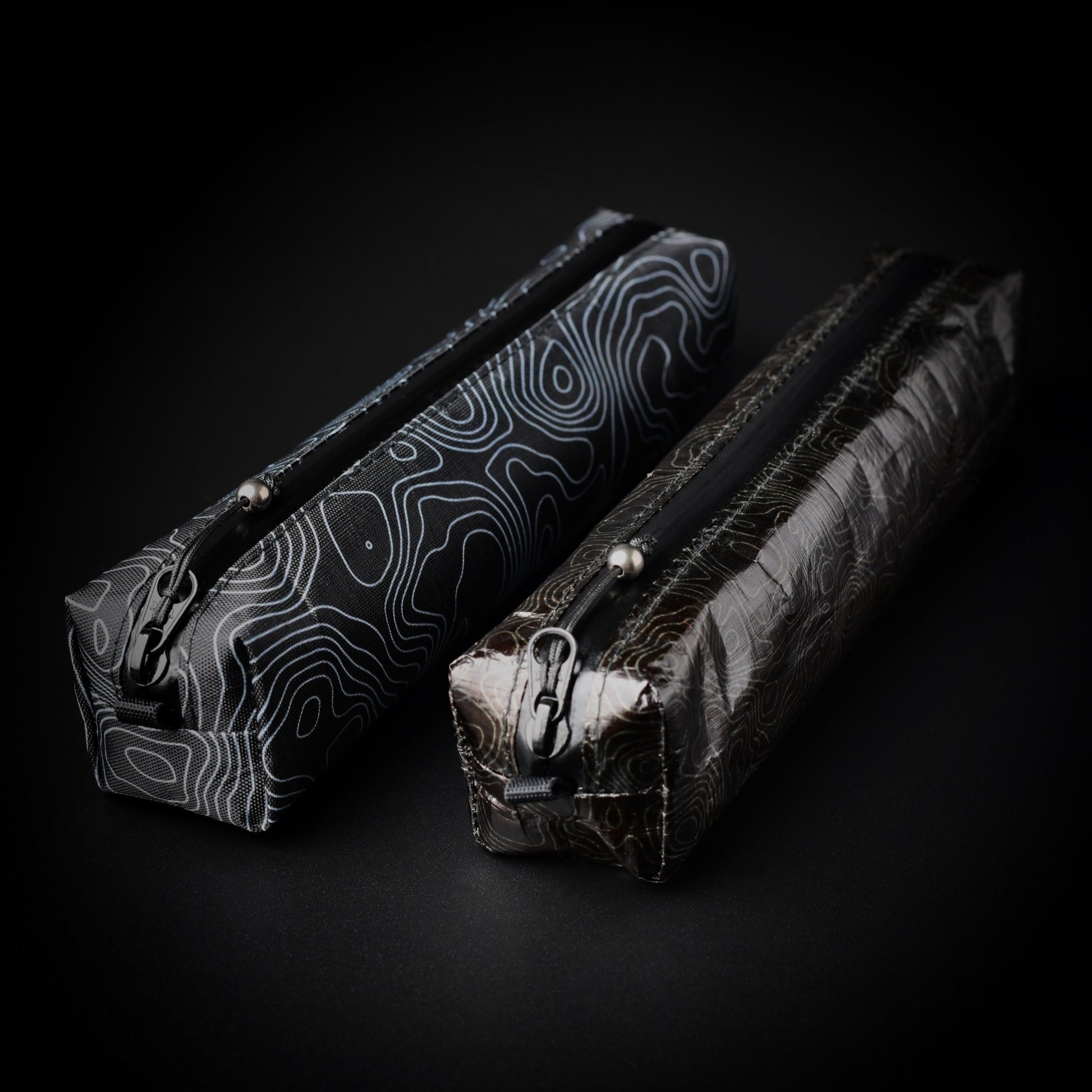 VX15 X-Pac and Dyneema Composite Fabric Topo Writing Instrument Cases shown side by side.