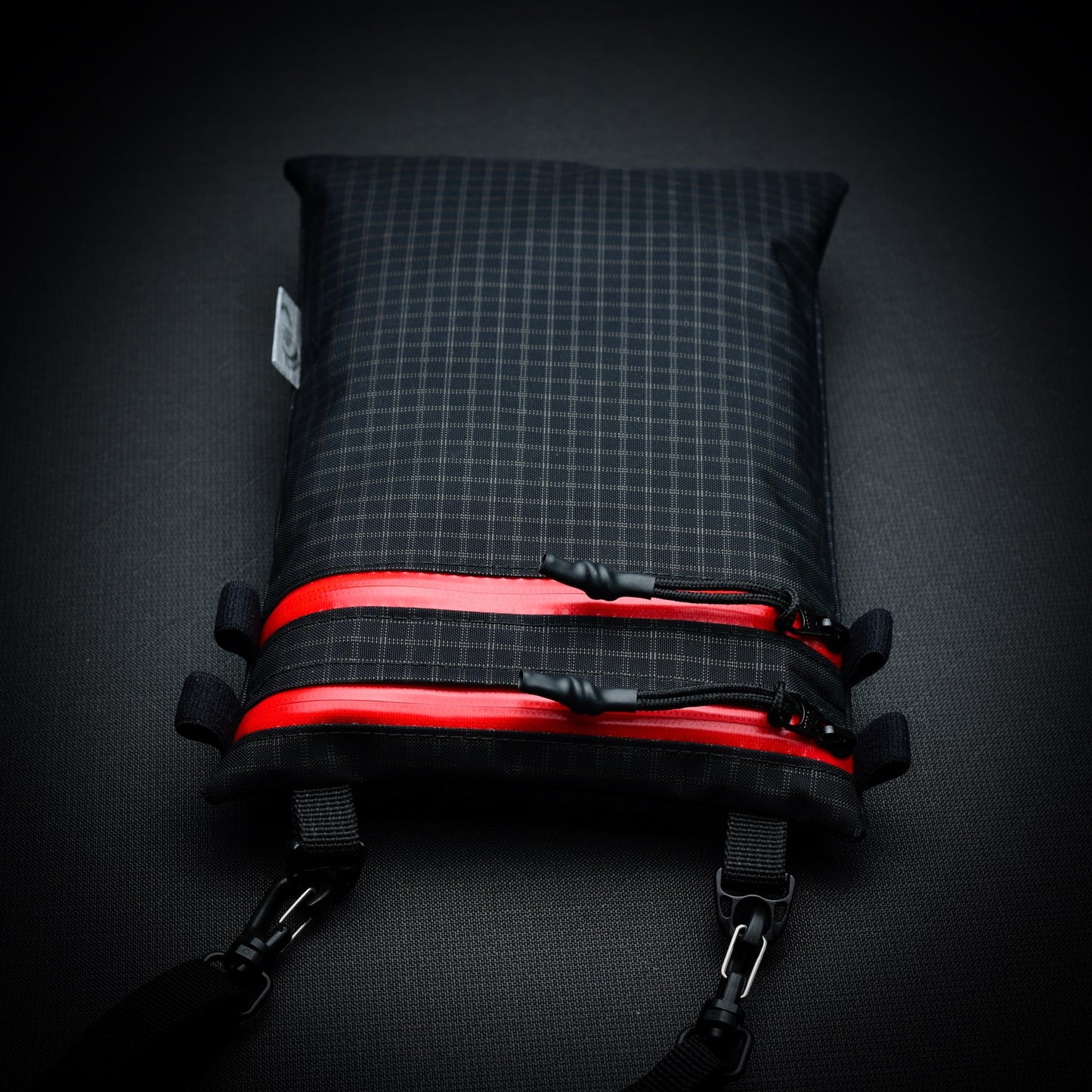 Ultralight Challenge UltraGrid twin zip shoulder bag with quick-release strap. Two YKK AquaGuard zip pockets for phone, wallet, passport and EDC gear.