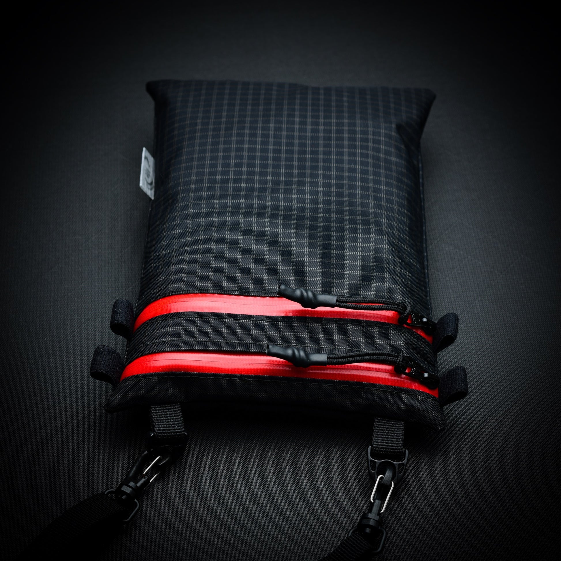 Ultralight Challenge UltraGrid twin zip shoulder bag with quick-release strap. Two YKK AquaGuard zip pockets for phone, wallet, passport and EDC gear.