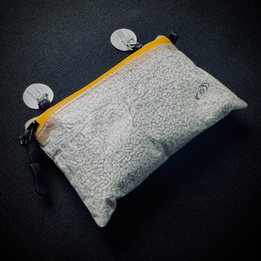 DCF backpack organiser pouch with yellow zip and two Microdot hanging points.
